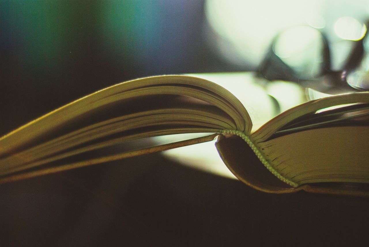 CLOSE-UP OF OPEN BOOK