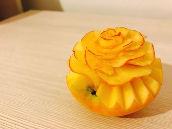 Close-up of yellow fruit on table