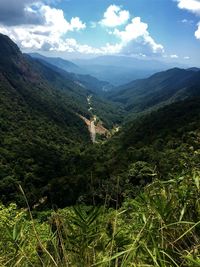 Scenic view of tree mountains against sky