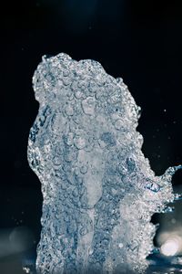 Close-up of ice crystals against black background