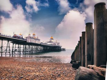 Panoramic view of sea and buildings against sky