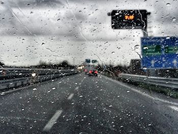 Road seen through car windshield