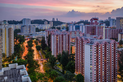 High angle view of buildings against sky during sunset