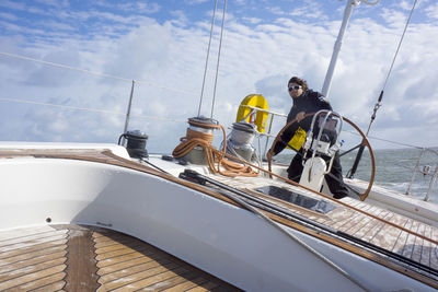 Man steering boat