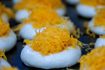 Close-up of fresh orange slices in plate