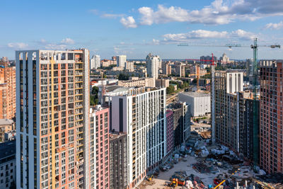 Aerial view of the construction of new residential areas of the city with a view of the horizon.