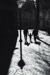 People walking on sidewalk