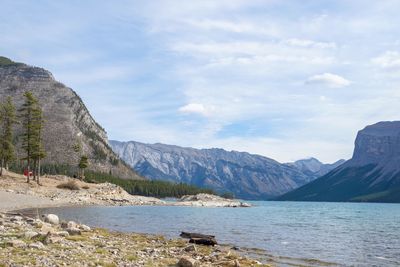 Scenic view of calm lake against mountain range