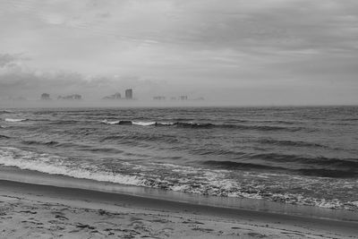 Scenic view of beach against sky