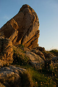 Scenic view of rock formation against sky