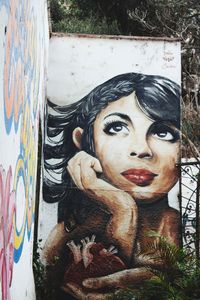 Portrait of woman with graffiti