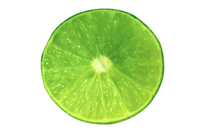 Directly above shot of lemon slice against white background