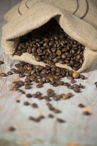 Close-up of coffee beans on table