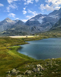 Scenic view of lake and mountains in swiss alps