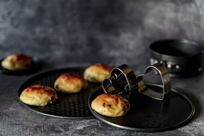 Close-up of fruits in plate on table