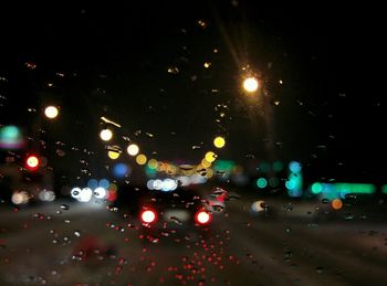Cars on road at night