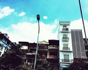 Low angle view of building against blue sky