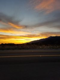 Scenic view of mountains against sky during sunset