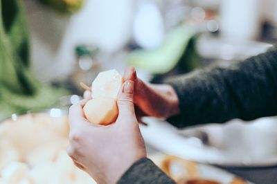 Close-up of hands holding ice cream