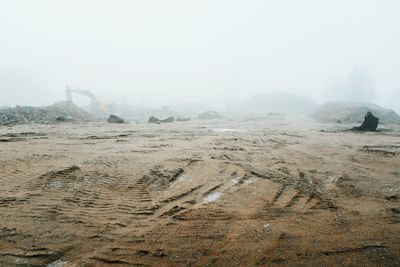 Scenic view of desert against clear sky