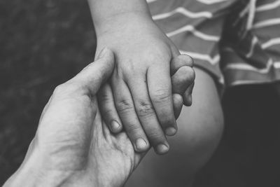 Midsection of man with hands