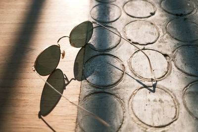 High angle view of eyeglasses on floor