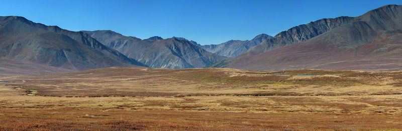 Scenic view of mountains against clear sky