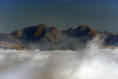 Scenic view of mountains against sky