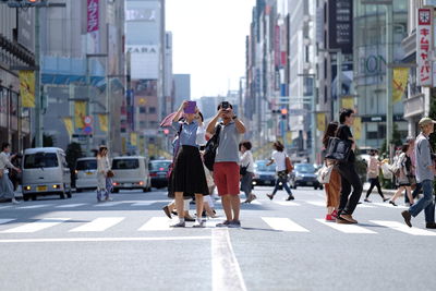 Woman walking on city street