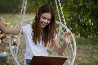 Young woman using laptop