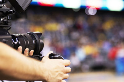 Close-up of hand holding camera