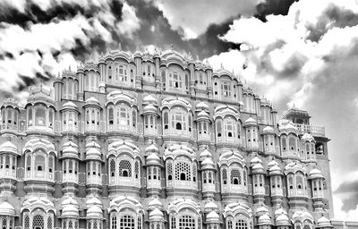 Low angle view of historical building against cloudy sky