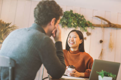 Business people working in cafe