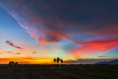 Scenic view of dramatic sky during sunset