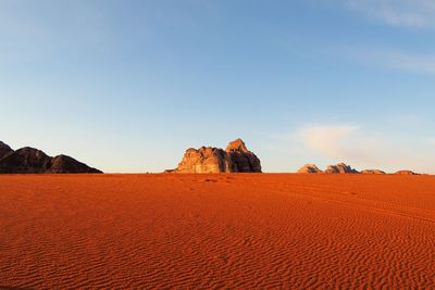 Scenic view of desert against clear sky