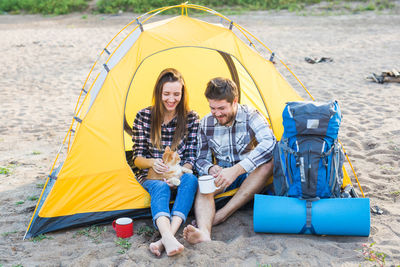 People sitting in tent