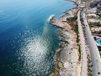 High angle view of road by sea