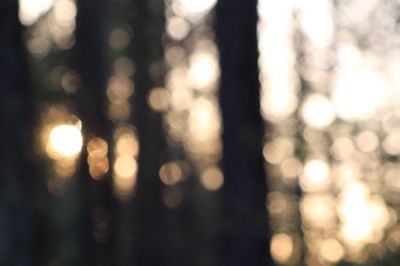 Defocused image of illuminated city at night