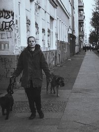 Portrait of man on street in city