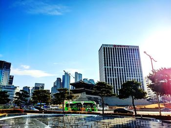 Modern buildings against sky in city