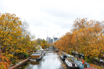 Scenic view of river against sky during autumn