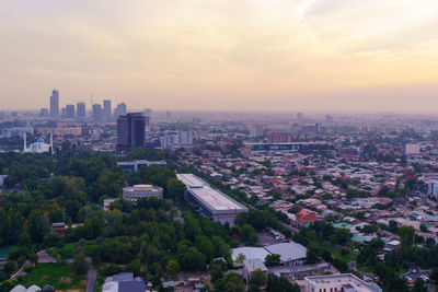 High angle view of townscape against sky during sunset