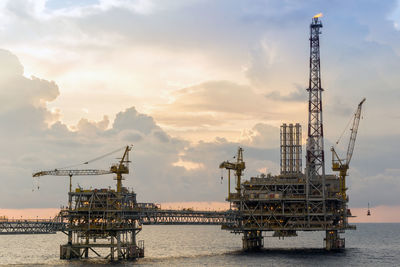 Seascape of an oil production platform during sunset at offshore terengganu oil field