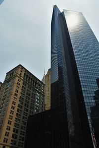 Low angle view of modern buildings against sky