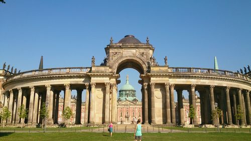 Tourists in front of historical building