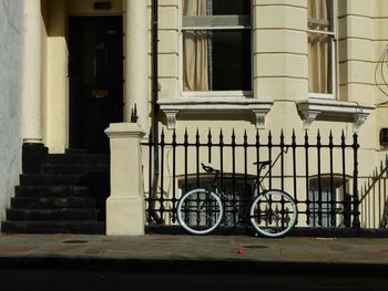 Bicycle parked outside building