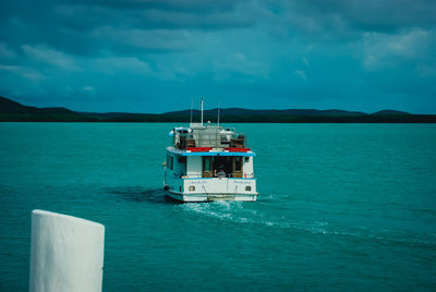 Boat in sea against sky