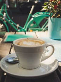 Close-up of coffee served on table