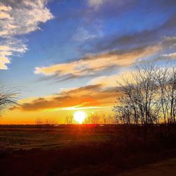 Scenic view of sunset over landscape