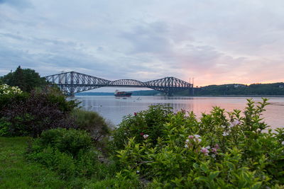 Bridge over river against sky